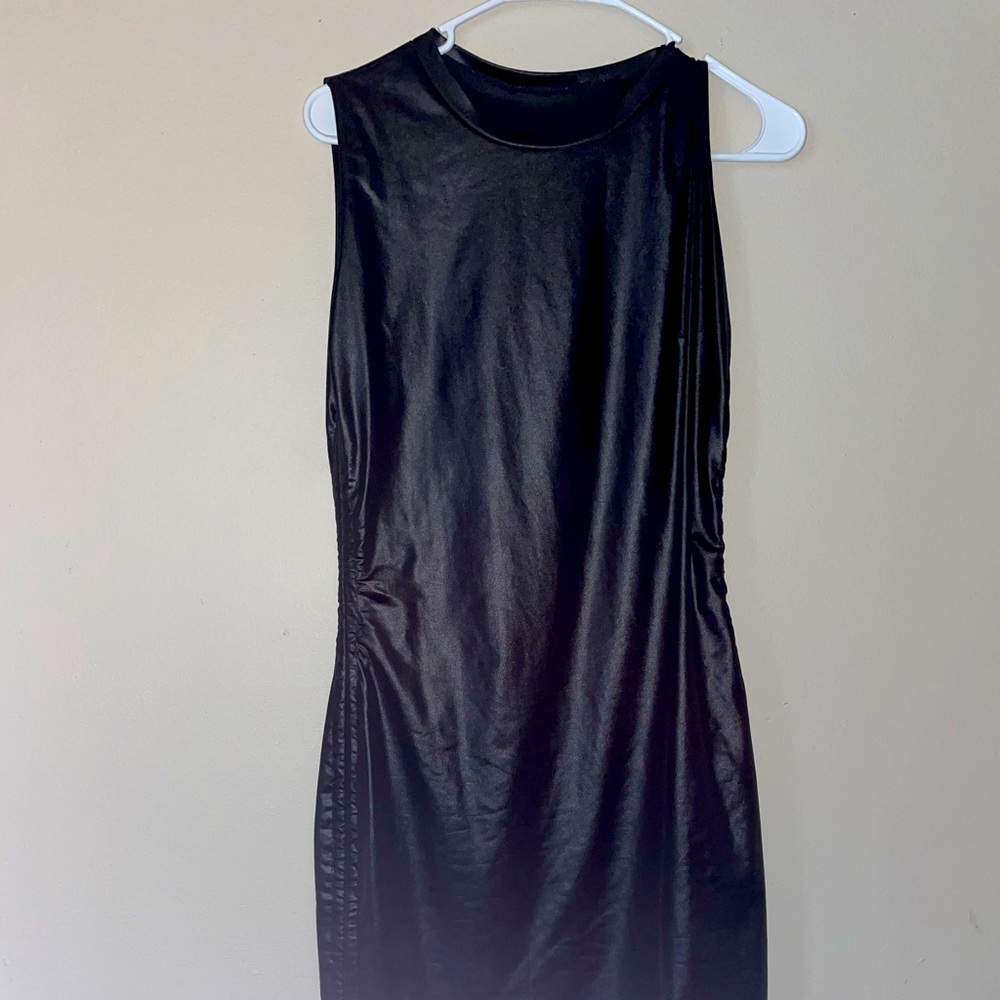 Super cute dress has strings on the side to make shorter